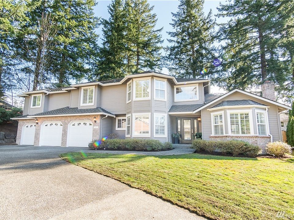A spacious 4,186 sq ft home awaits you / large 3 garage / nice level backyard & deck!