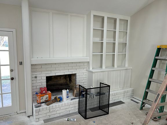Fireplace and built in storage