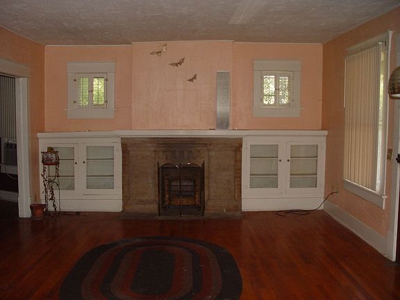 Wonderful Fireplace Flanked by Bookcases