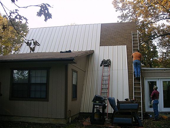 putting the metal roof on