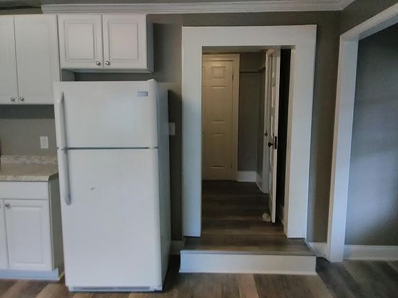 Side of Kitchen facing hallway to Larger Bedroom
