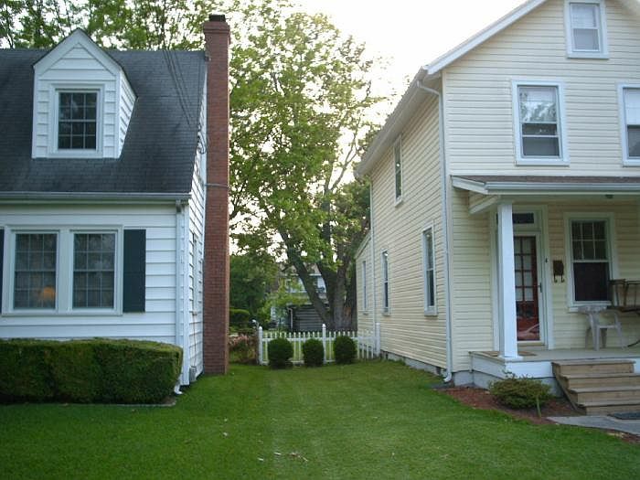 Lft side view - yellow house