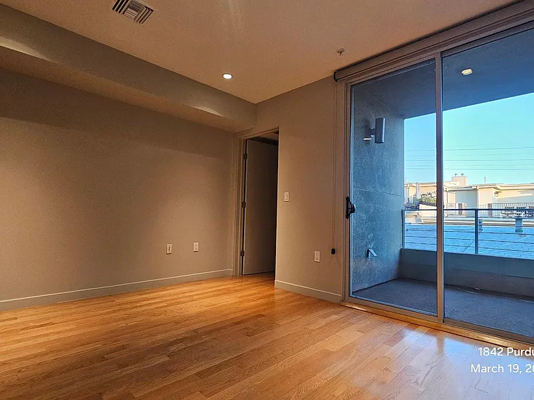 main bedroom has a balcony that share with its living room