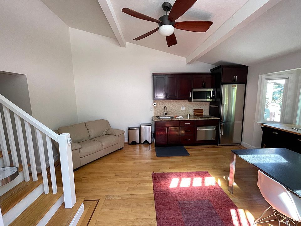 Kitchen and Great Room (living area)
(bed likely to be where couch is)