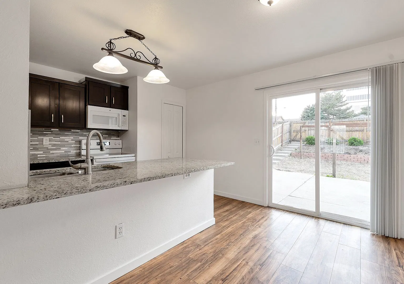 2 Bedroom Duplex with Updates, Large Fenced Backyard, Patio and Spacious RV Parking — Photo 2