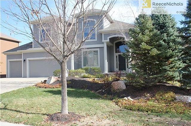 New exterior paint in today's colors!  This former BL Reike model has four bedrooms, a loft, three full baths, two half baths, and a finished walkout basement.  Stucco all the way around.