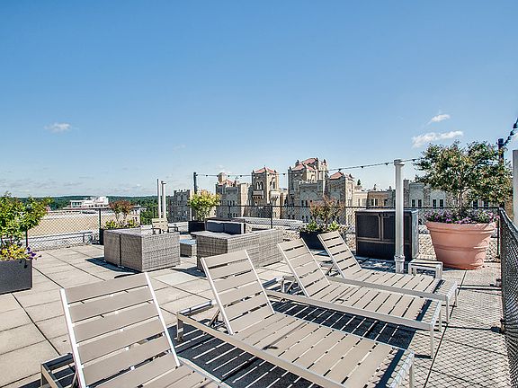 Rooftop deck with reclining lounge chairs