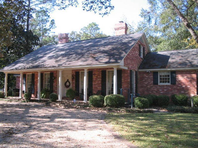 Inviting wide front sitting porch