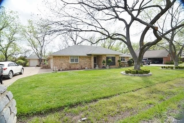 THE HOME EXUDES WARMTH & COMFORT