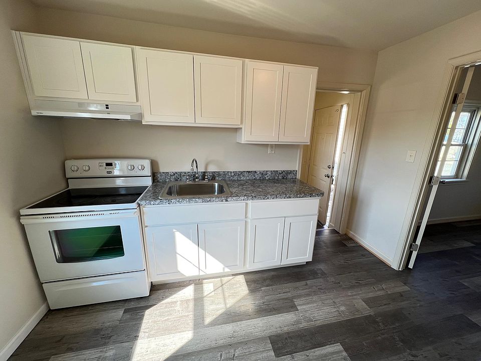 Clean and fresh kitchen: new customer cabinets/counter tops, new appliances. New floors, walls, etc. HVAC, and all utilities are included: electric, gas, water/sewer, trash, lawn care. No cable/internet is included. Parking for one vehicle. No pets.