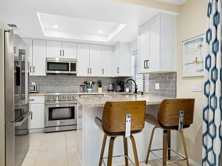 Kitchen with Thor & Bosch stainless appliances.