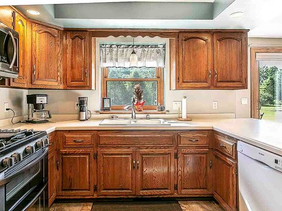 large kitchen with spacious snack bar area