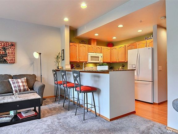 Kitchen with eat in bar for plenty of room to sit.