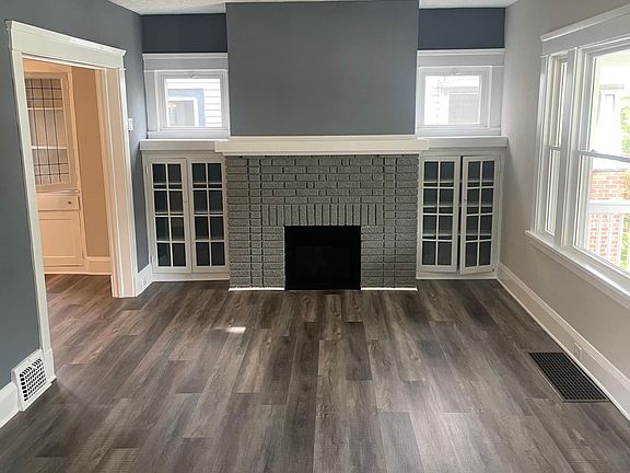 Living room with vinyl plank flooring throughout