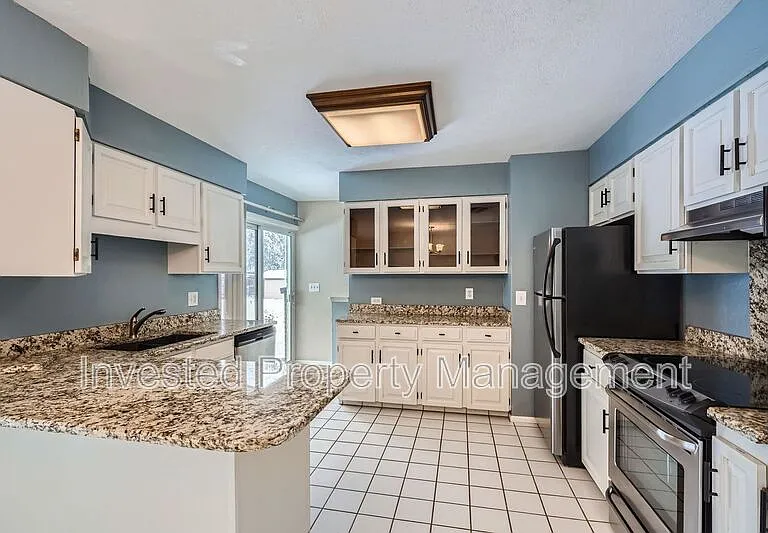 9091 Raleigh St — Photo 11