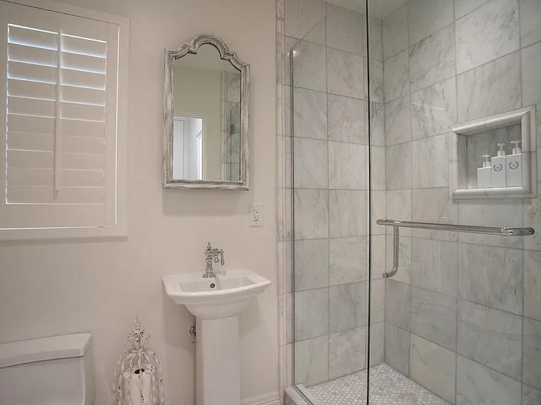 Second bathroom off of Kitchen and third bedroom.