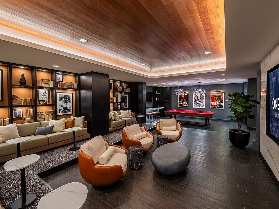 The refreshed theater and social room at One Light Luxury Apartments