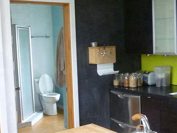 Bathroom with full-size washer and dryer
