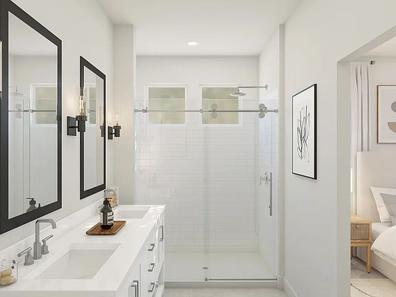 Primary bath with glass-shower enclosure