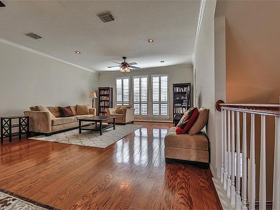 LIVING ROOM - Inviting and open with an abundance of natural light.