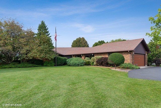 Quality-built all brick ranch nestled on 2.69 acres!