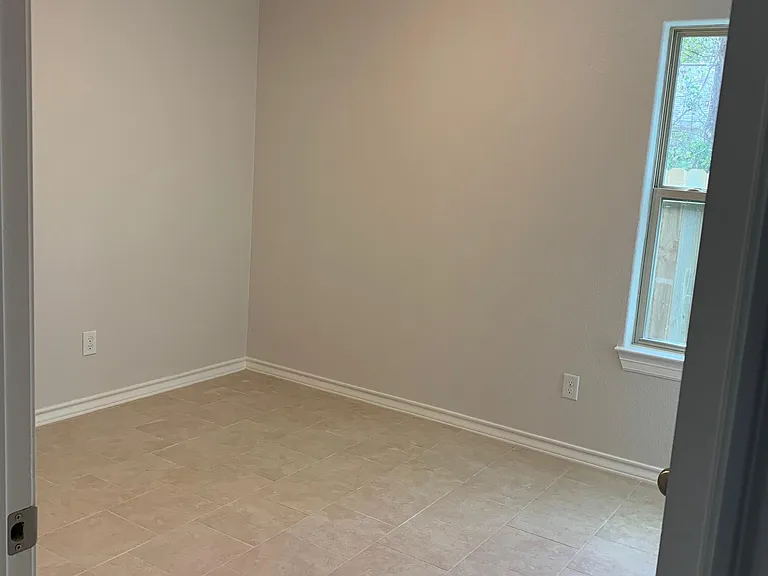 Bedroom 3, from hall. Same size and closet as bedroom 2