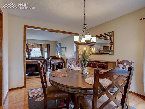 View of formal dining room looking into formal living room.