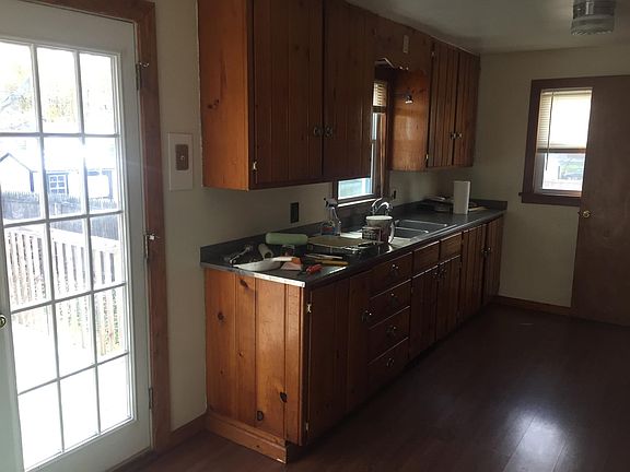 Knotty pine cabinets. Deck off kitchen.