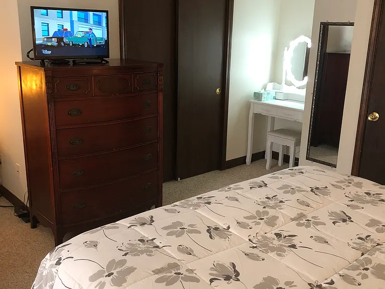 Master queen bedroom with vanity, large closet, cable TV, dressing mirror