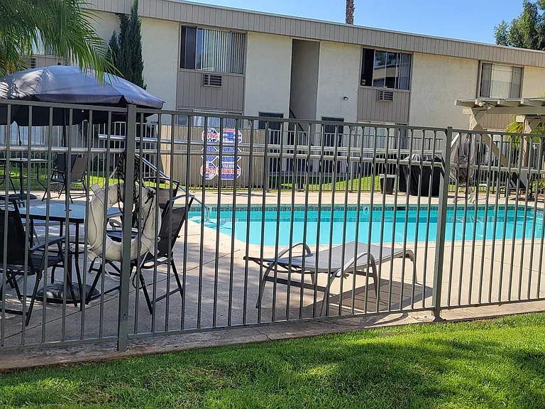 Sparkling clean and inviting swimming pool at IKARIA Apartments in Santee, California.