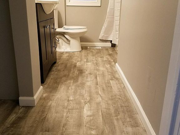 remodeled bathroom with new floor