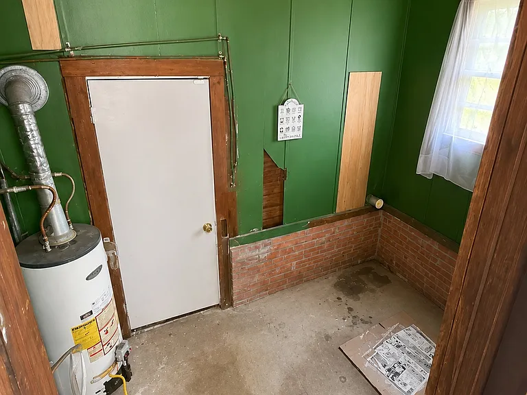 Dedicated Laundry & Utility Room providing extra storage and convenient utility space.