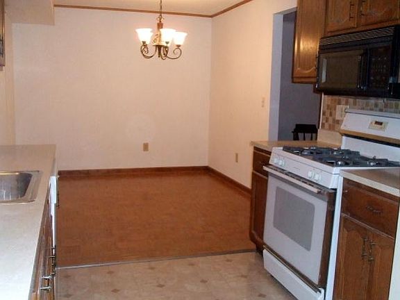 Kit opens to Dining Room & Sliders to Your Yard!