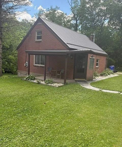 212 Lutz Rd — Photo 1