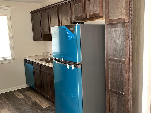 Brand new stainless steel Frigidaire appliances.