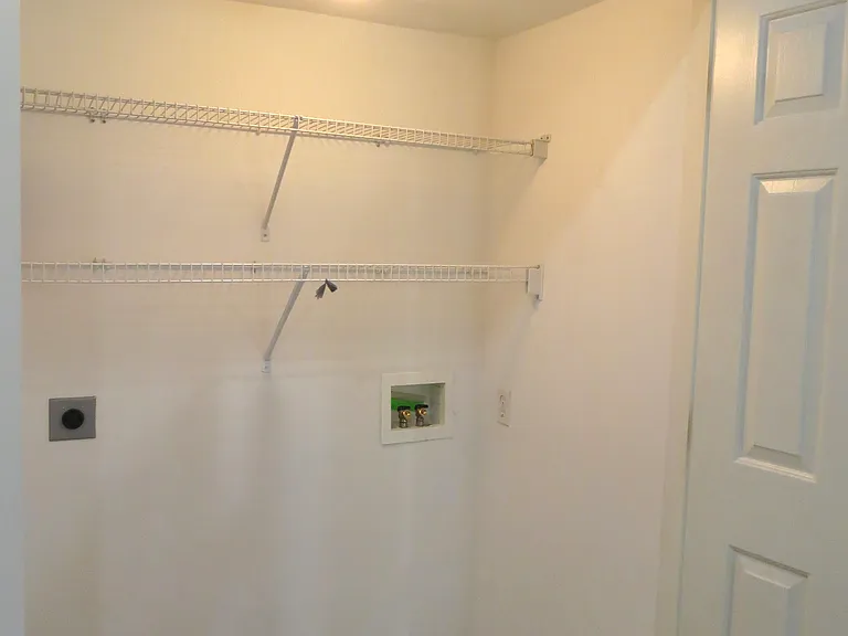 Laundry closet off kitchen