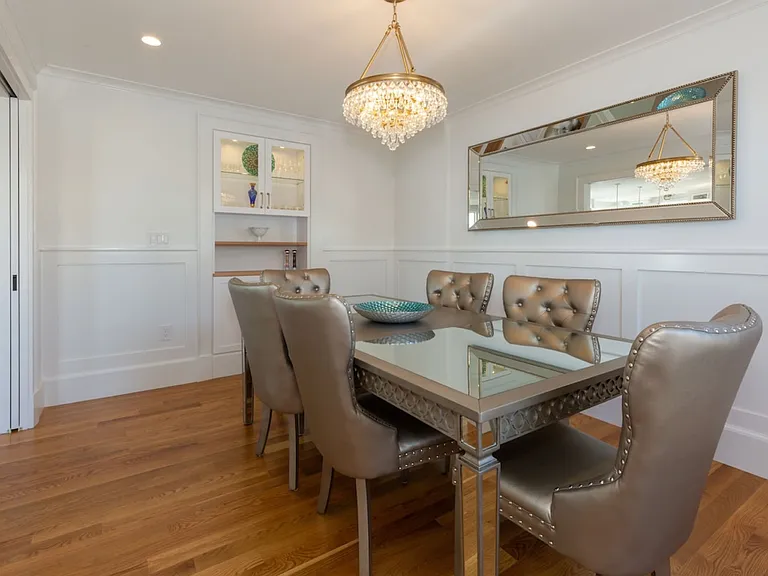Elegant dining room with sliding French doors