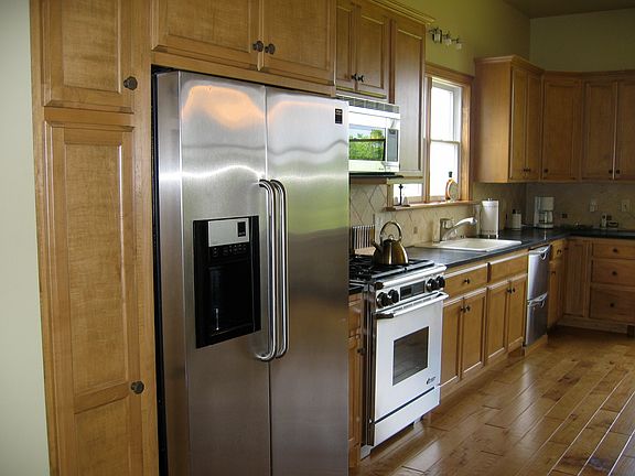 Custom Cabinets & hdwd floor