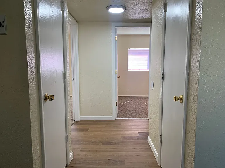 Adorable Fourplex Nestled in Four Hills — Photo 5
