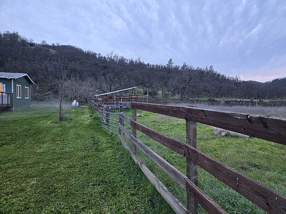 Side yard with 2 anamal pastures