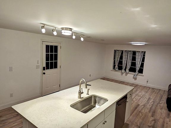 Front door open to living room, side door opens from carport to kitchen, backdoor opens to the yard