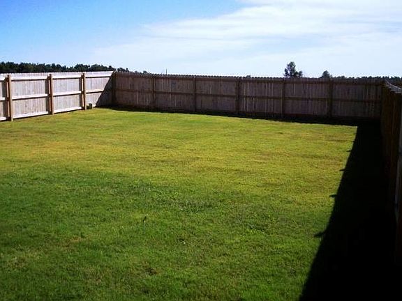 privacy fenced backyard