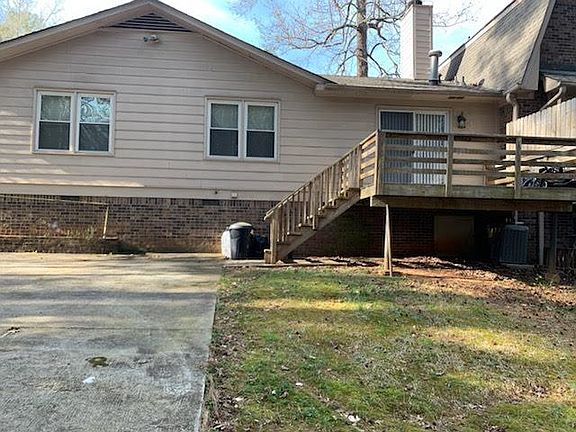 BACK ENTRY KEY LOCKED SLIDING PATIO DOOR, UP STAIRS, PARKING FOR 2 CARS PAVED PARKING PAD