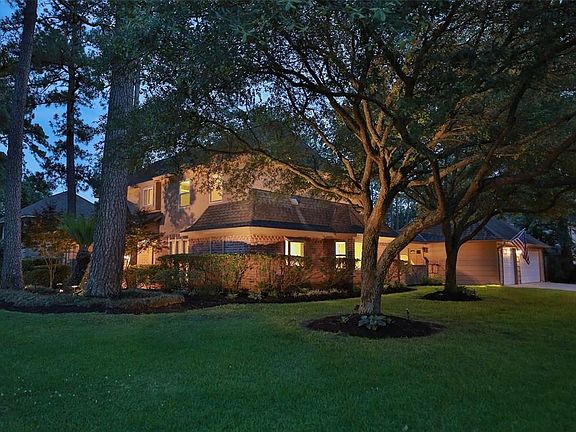 AMAZING MATURE OAK TREES CAST A DELIGHTFUL SHADE ON THIS 4 BEDROOM HOME