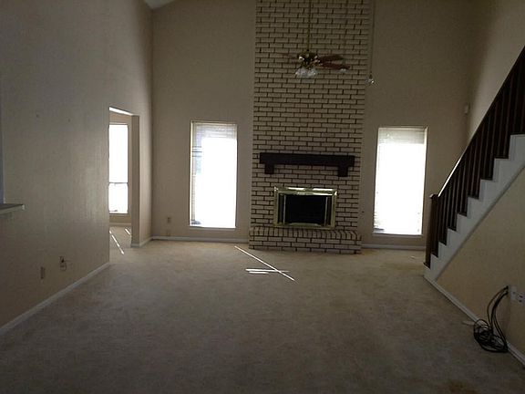 ANOTHER VEIW OF FAMILY ROOM WITH GAS FIREPLACE