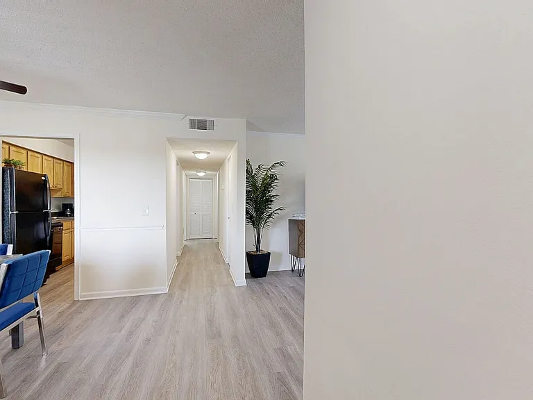 Entry way with hardwood-style flooring