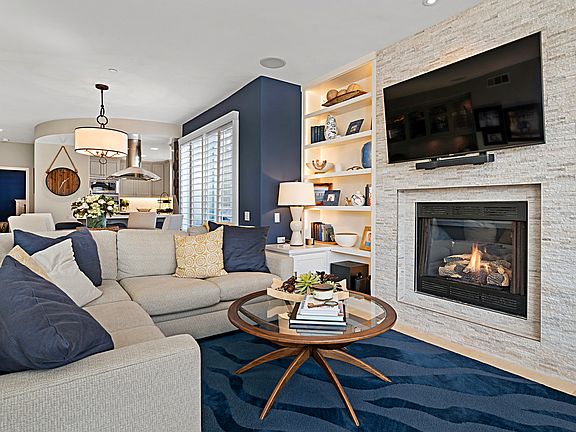 Step into a wonderful, cozy living space designed for comfort and relaxation. The living area features an open floor plan, creating an inviting atmosphere perfect for unwinding after a day at the beach or entertaining guests.