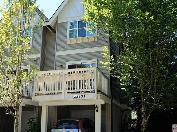 Back: 1 car garage and 1 covered parking