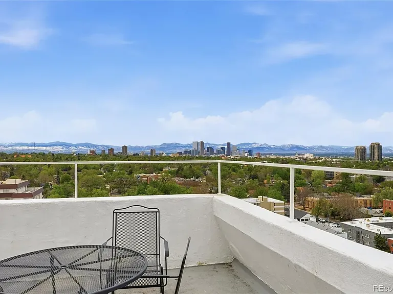 Rooftop deck with mountain and city views
