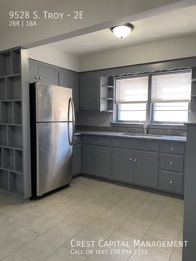 Building Photo - 9528 S Troy Ave #2E